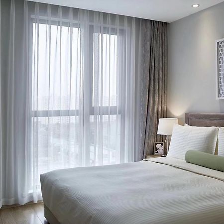 One Sunland Serviced Suites Managed By Lanson Place Shanghai Buitenkant foto